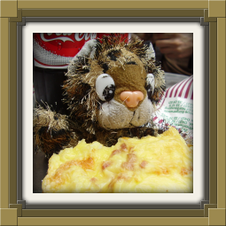 Junior enjoying a cheese bun at Werder-Bäcker-Bünger in Bremen