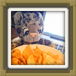 Junior eating spicy crisps