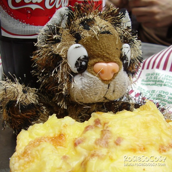Junior enjoying a cheese bun at Werder-Bäcker-Bünger in Bremen