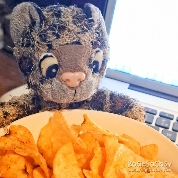 Junior eating spicy crisps